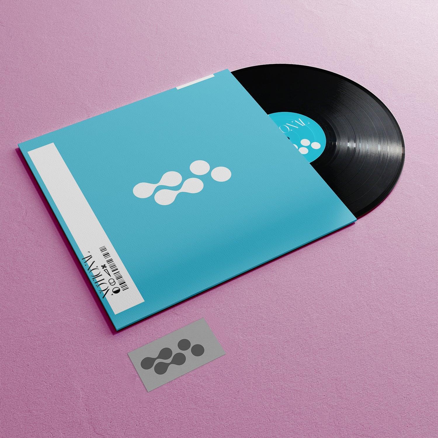 Photorealistic 12 Inch Vinyl Record Mockup: Editable Disc in Sleeve & Download Card with Stunning Album Art.